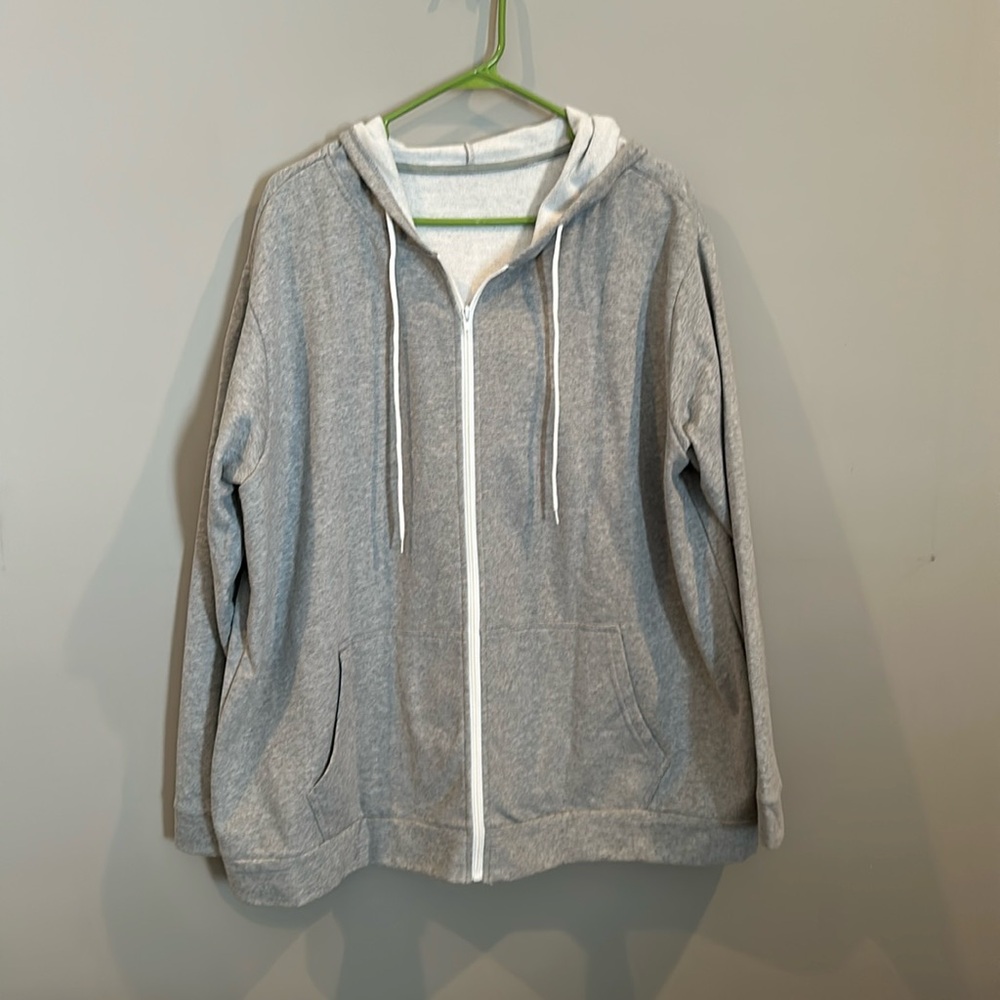 Plus size women’s full zip grey hoodie.